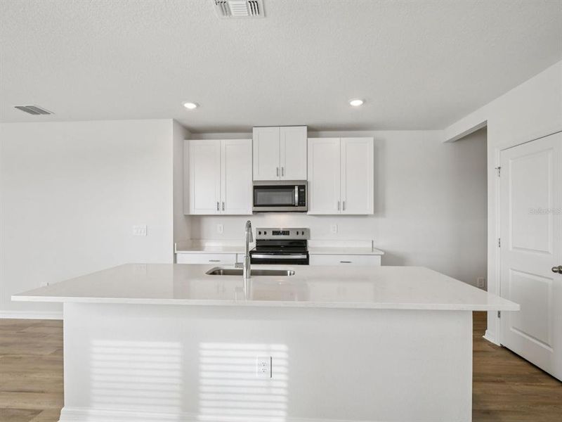 Furnished interior view inside a new home in Two Rivers - Premier Series, Zephyrhills (Image 6).