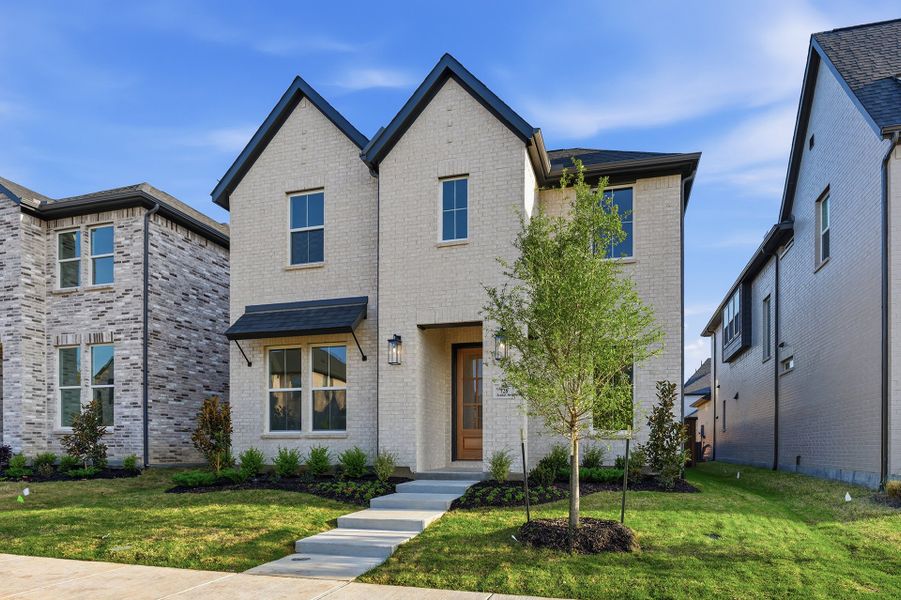 Front exterior of a new home in Light Farms Brenham - 40' Lots, Celina, TX, highlighting curb appeal (Image 21).