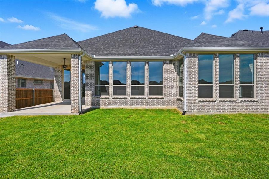 Exterior details and patio area of a home in Sandbrock Ranch: 60ft. lots, Aubrey (Image 3). Exterior details and patio area of a home in Sandbrock Ranch: 60ft. lots, Aubrey (Image 3).