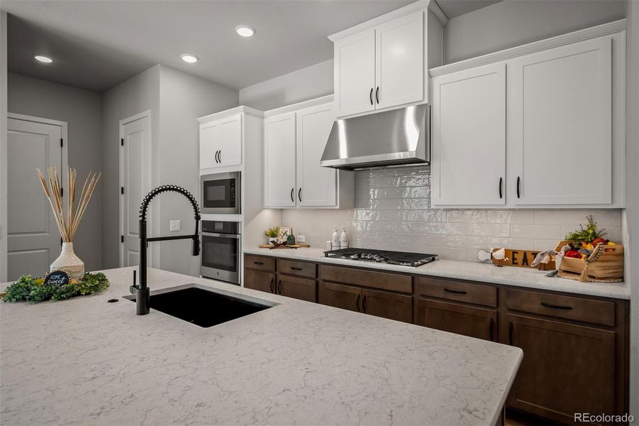 Furnished interior view inside a new home in Revel Crossing at Wolf Ranch – The Outlook Collection, Colorado Springs (Image 10).