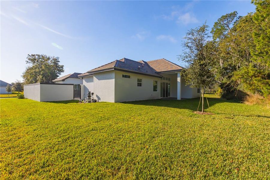 Exterior details and patio area of a home in Toscana, Palm Coast (Image 29).