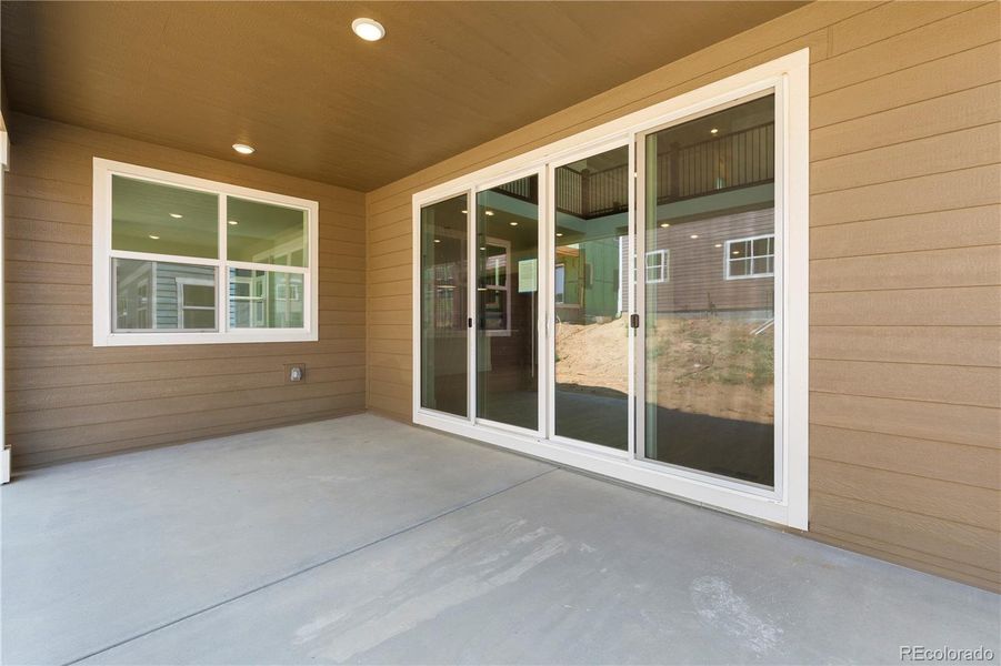 Exterior details and patio area of a home in Dillon Pointe - Journey, Broomfield (Image 3).