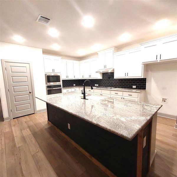 Furnished interior view inside a new home in , Royse City (Image 8).