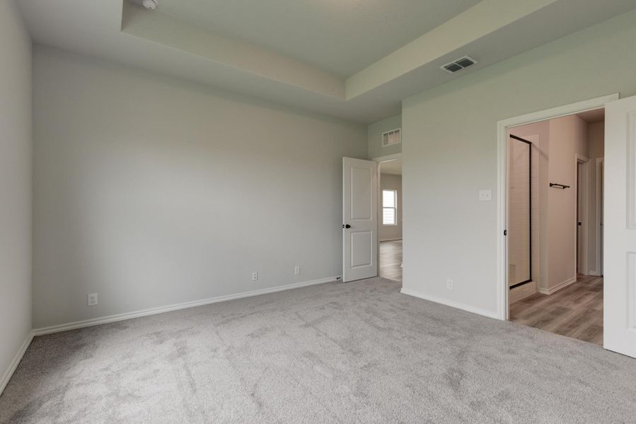 Representative unfurnished interior of a home built from the Travis by Ashton Woods in Meadows at Hennersby Hollow 40's, San Antonio (Image 9).
