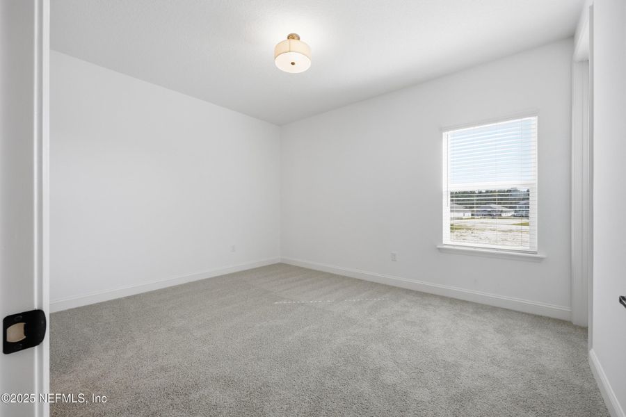 Spacious, unfurnished interior of a new home in Silver Landing At Silverleaf, St. Augustine (Image 30).