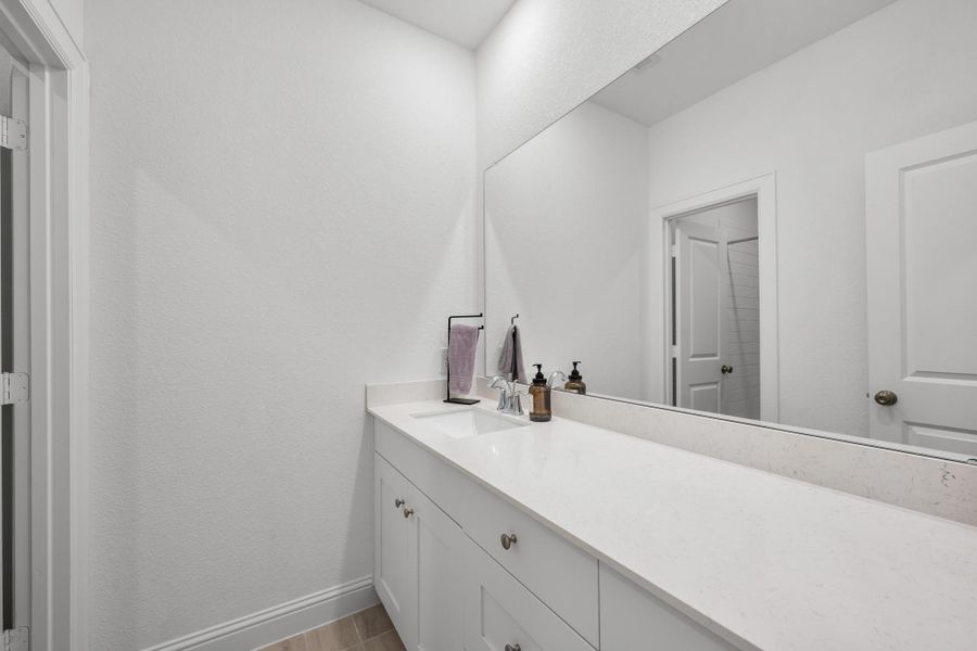 Furnished interior view inside a new home in The Highlands: Pinnacle Collection, Porter Heights (Image 15).