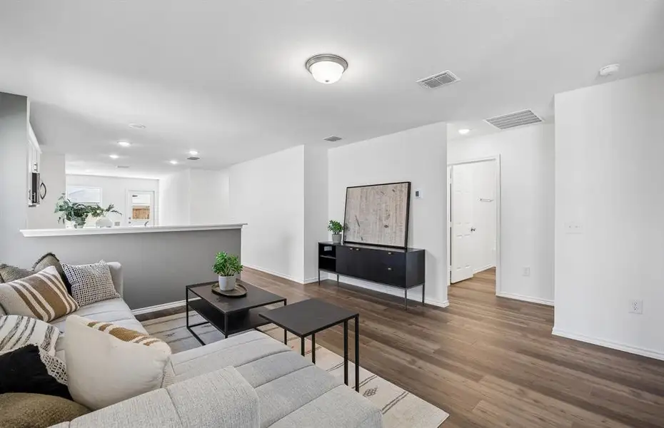 *Model Representation - Gathering room with view of main living areas