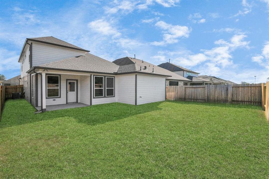 Take another glimpse at the spacious backyard!