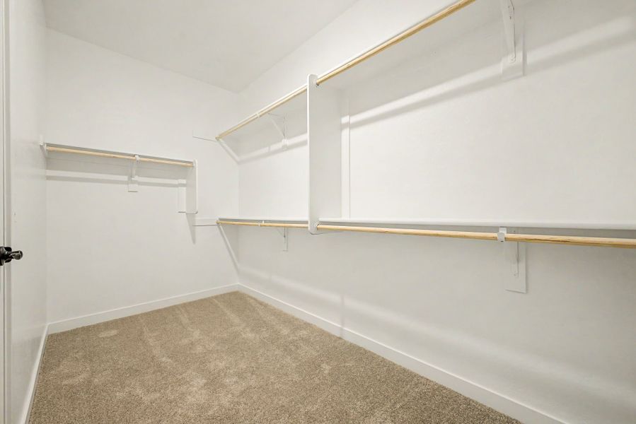Spacious, unfurnished interior of a new home in The Villages at North Copper Canyon, Surprise (Image 10).