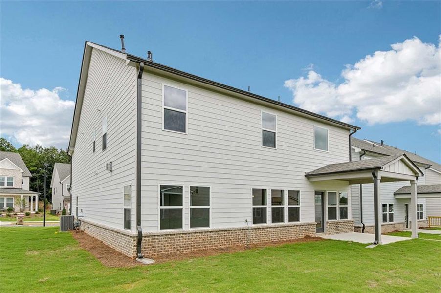 Exterior details and patio area of a home in Eastlyn Crossing - Single Family, Flowery Branch (Image 3). Exterior details and patio area of a home in Eastlyn Crossing - Single Family, Flowery Branch (Image 3).