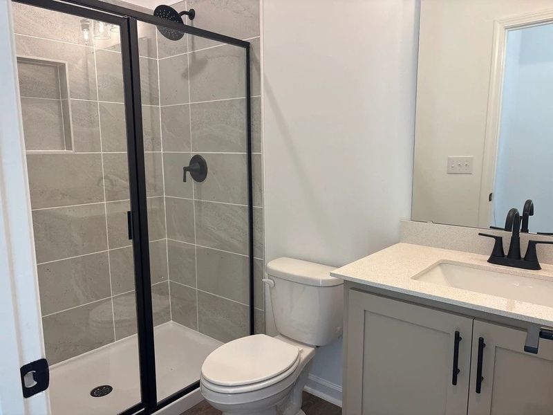 Guest Bath featuring the AW Collection® Foundry - Subtle textures with modern restraint.