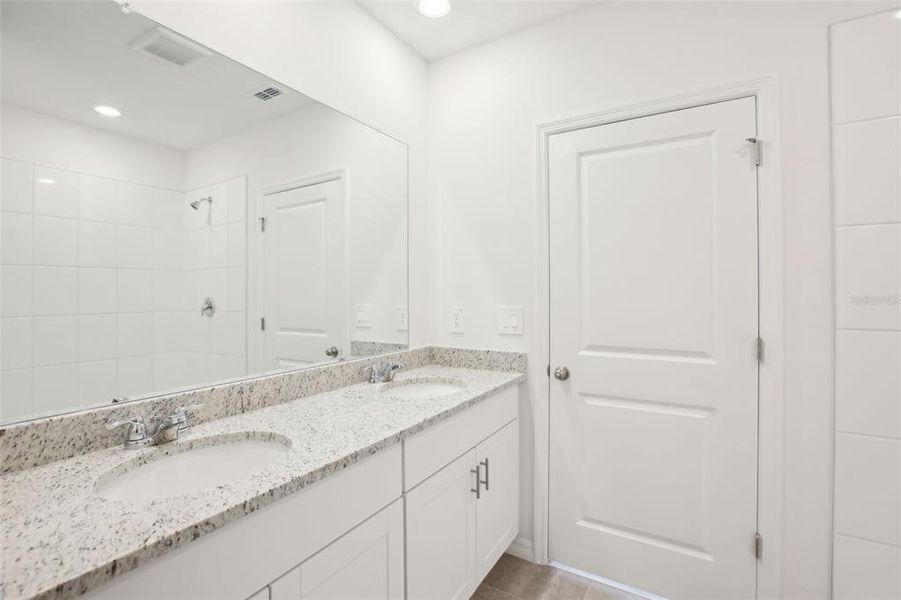 Furnished interior view inside a new home in Benton Hills - Premier Series, Brooksville (Image 8). Furnished interior view inside a new home in Benton Hills - Premier Series, Brooksville (Image 8).