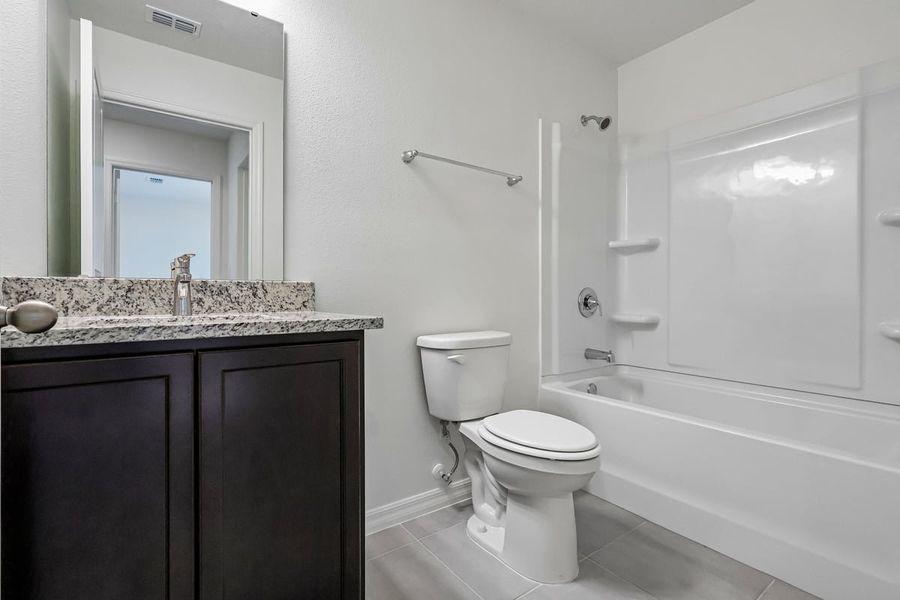 Furnished interior view inside a new home in Hilliard Ridge, Kissimmee (Image 12).