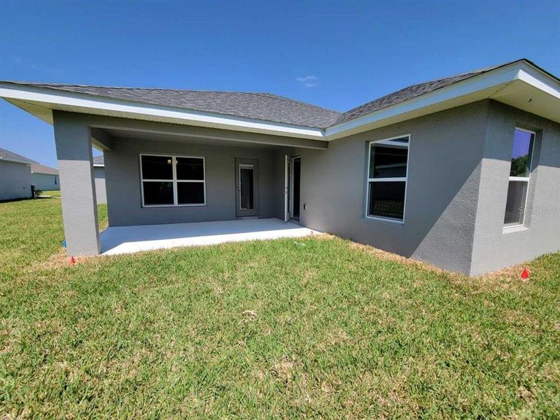 Exterior details and patio area of a home in Ocala Crossings South, Ocala (Image 2). Exterior details and patio area of a home in Ocala Crossings South, Ocala (Image 2).