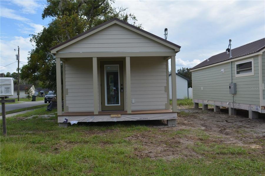 Front exterior of a new home in , Oviedo, FL, highlighting curb appeal (Image 11). Front exterior of a new home in , Oviedo, FL, highlighting curb appeal (Image 11).