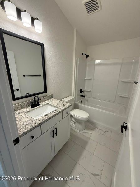 Furnished interior view inside a new home in Winding Oaks, Weeki Wachee (Image 5).