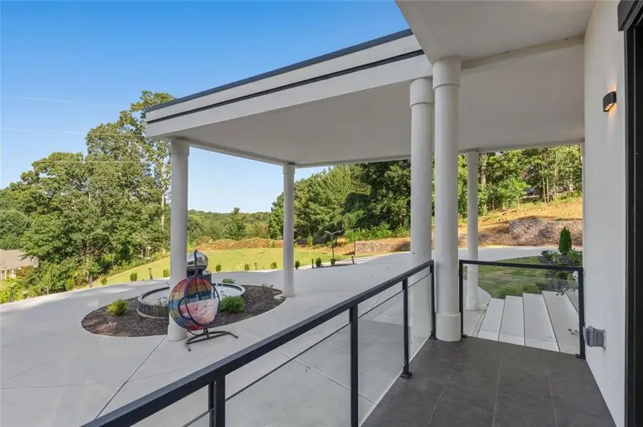 Exterior details and patio area of a home in , Stone Mountain (Image 3).