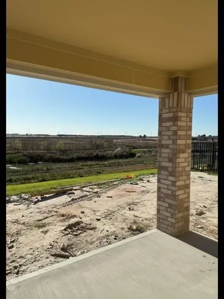 Exterior details and patio area of a home in Bridgeland, Cypress (Image 3). Exterior details and patio area of a home in Bridgeland, Cypress (Image 3).