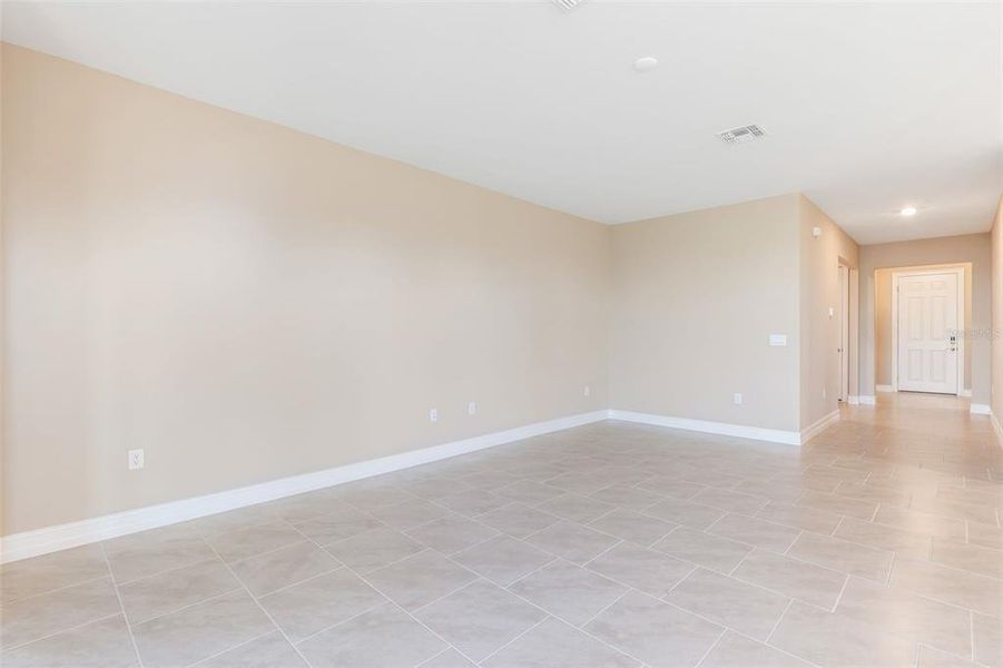 Spacious, unfurnished interior of a new home in Deep Creek Tradition Series, Punta Gorda (Image 15).