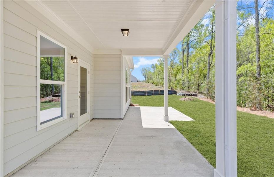 Exterior details and patio area of a home in Reunion, Flowery Branch (Image 3).