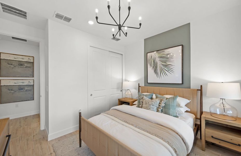 Representative furnished interior of a home built from the Palmary by DiVosta in BeachWalk by Manasota Key, Englewood (Image 26).