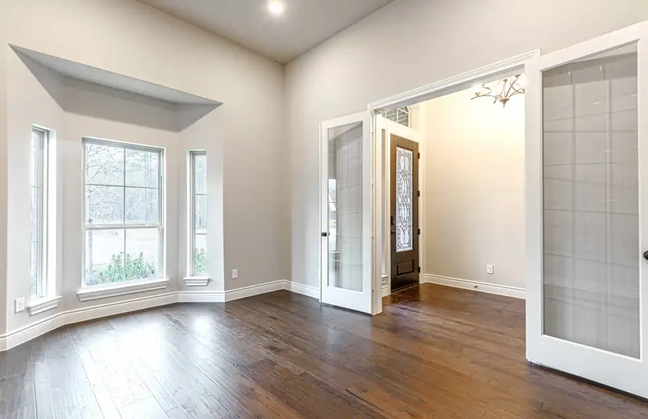Representative unfurnished interior of a home built from the 3616 by Ravenna Homes in Artavia 70′, Conroe (Image 21).