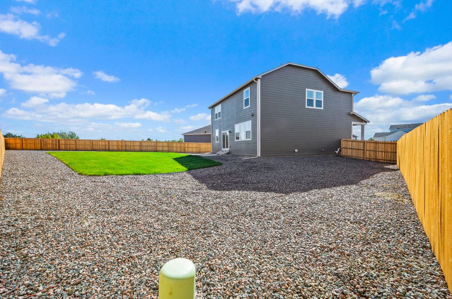 Exterior details and patio area of a home in The Glen-12, Colorado Springs (Image 27).