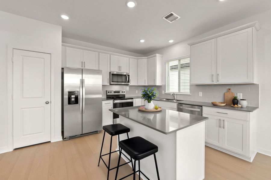 Representative furnished interior of a home built from the Rayburn by Centex in Alto, San Marcos (Image 5).