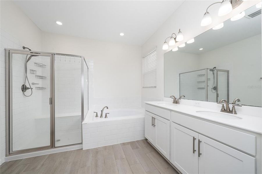 Furnished interior view inside a new home in Seasons at Big Sky, Kissimmee (Image 16).