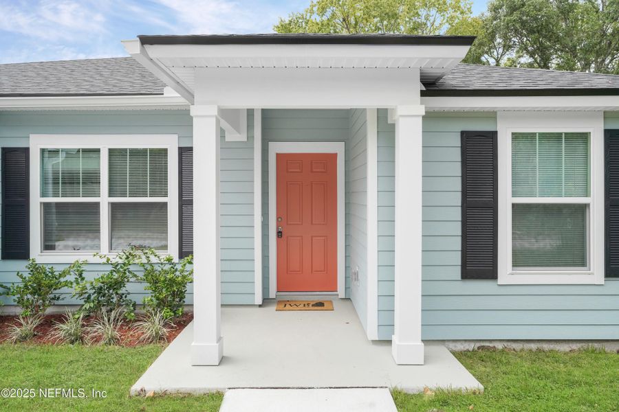 Front exterior of a new home in , Jacksonville, FL, highlighting curb appeal (Image 2).