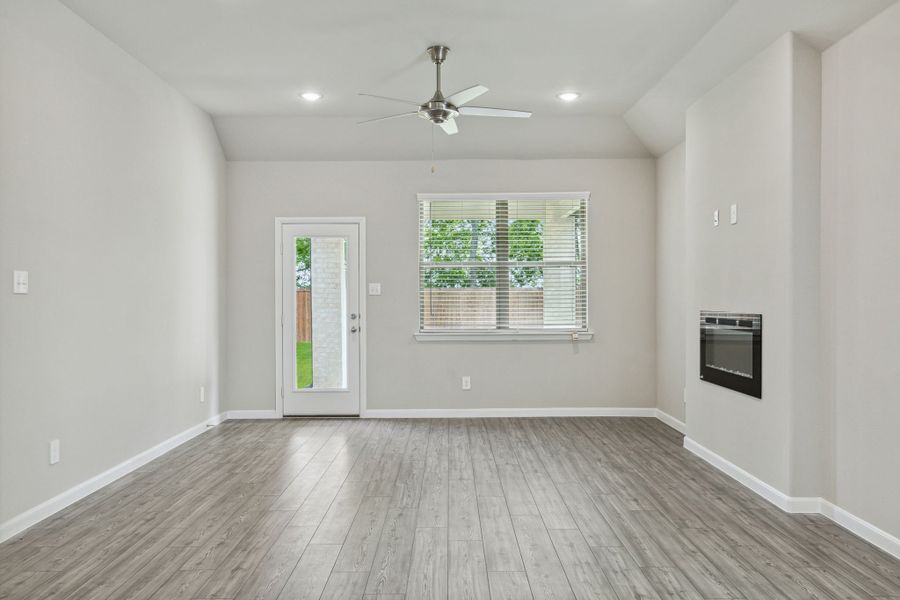 Living Room in the Pearl home plan by Trophy Signature Homes – REPRESENTATIVE PHOTO