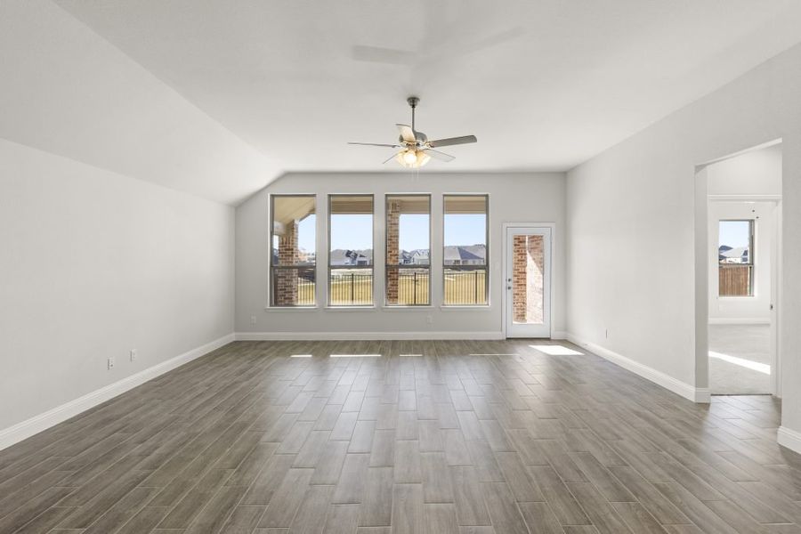 Representative exterior photo of a completed home built from the Kingston by Impression Homes in Arcadia Trails, Balch Springs, TX (Image 14).