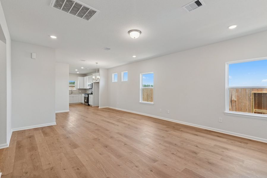 The Blue Jay II- Family Room into the Dining Area and Kitchen