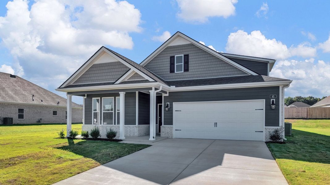 Front exterior of a new home in Riverwood Gardens, Oakland, TN, highlighting curb appeal (Image 2).