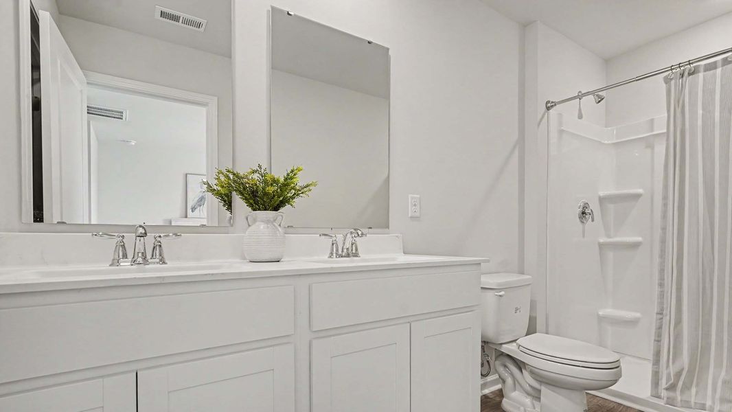 Furnished interior view inside a new home in Fox Run, Supply (Image 13). Furnished interior view inside a new home in Fox Run, Supply (Image 13).