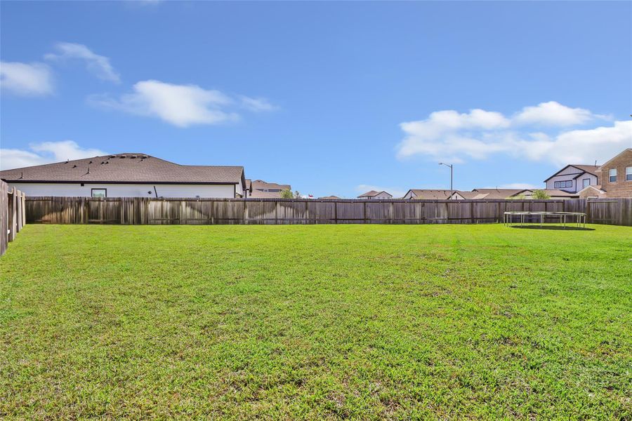 Exterior details and patio area of a home in Granger Pines, Conroe (Image 24).