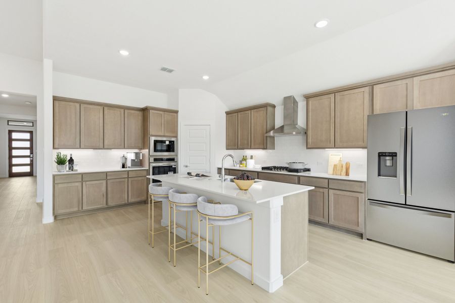 Kitchen in the Gilmour II home plan by Trophy Signature Homes – REPRESENTATIVE PHOTO