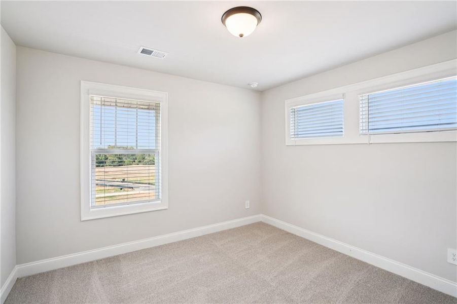 Spacious, unfurnished interior of a new home in Hemingway - Highland Series, Cumming (Image 27).