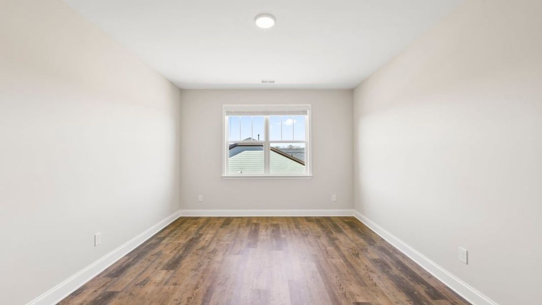 Representative unfurnished interior of a home built from the Crestone by D.R. Horton in Blue Ridge Trail, Fountain Inn (Image 25).