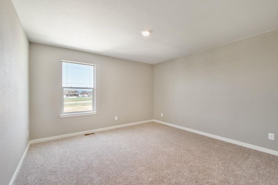 Representative unfurnished interior of a home built from the Holcombe by D.R. Horton in Brighton Crossing, Brighton (Image 26).
