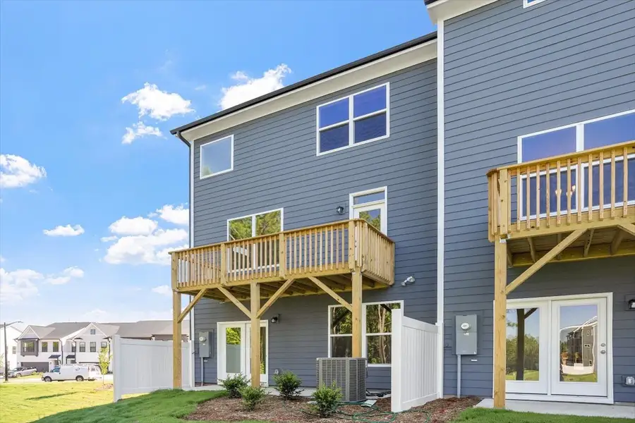 Exterior details and patio area of a home in Sweetbrier, Durham (Image 4).