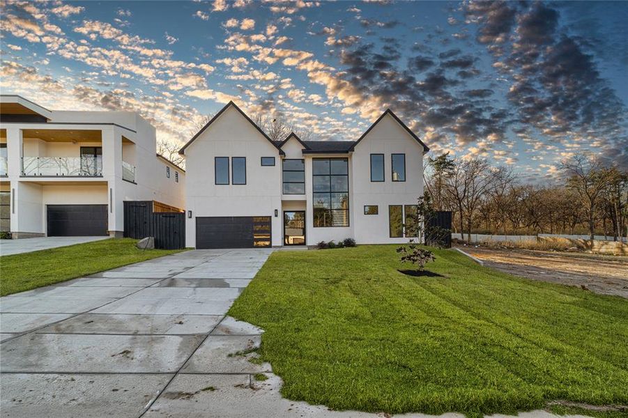Front exterior of a new home in , Dallas, TX, highlighting curb appeal (Image 19).
