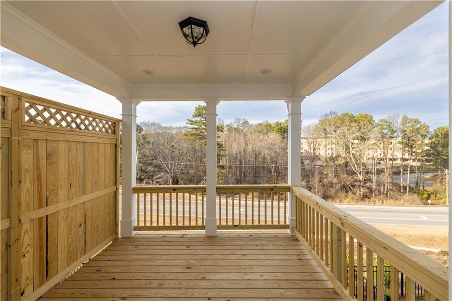 Exterior details and patio area of a home in Millcroft Townhomes, Buford (Image 2).