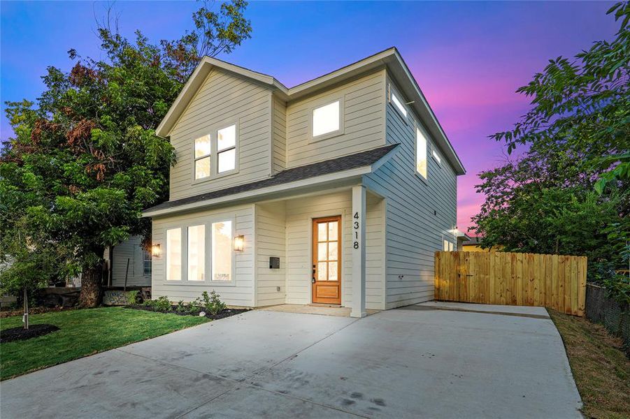 Front exterior of a new home in , Dallas, TX, highlighting curb appeal (Image 20).