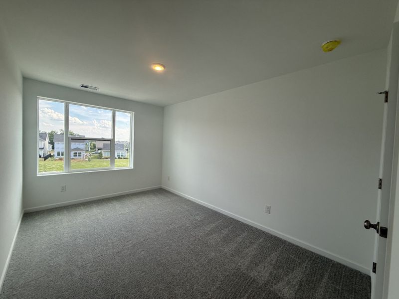 Spacious, unfurnished interior of a new home in Nexus Townhomes, Gallatin (Image 31).
