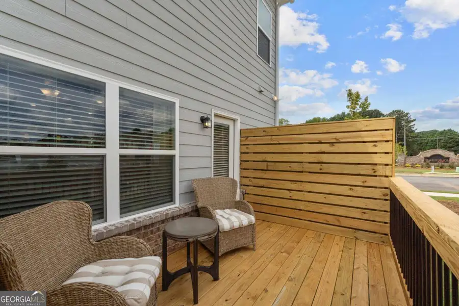 Exterior details and patio area of a home in Glendale Towns, Conyers (Image 3).