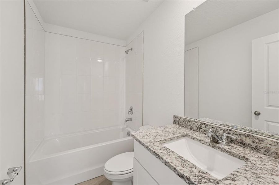 Furnished interior view inside a new home in Flagler Village - Classic Series, Palm Coast (Image 13).