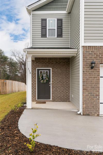 Exterior details and patio area of a home in , Arden (Image 4).