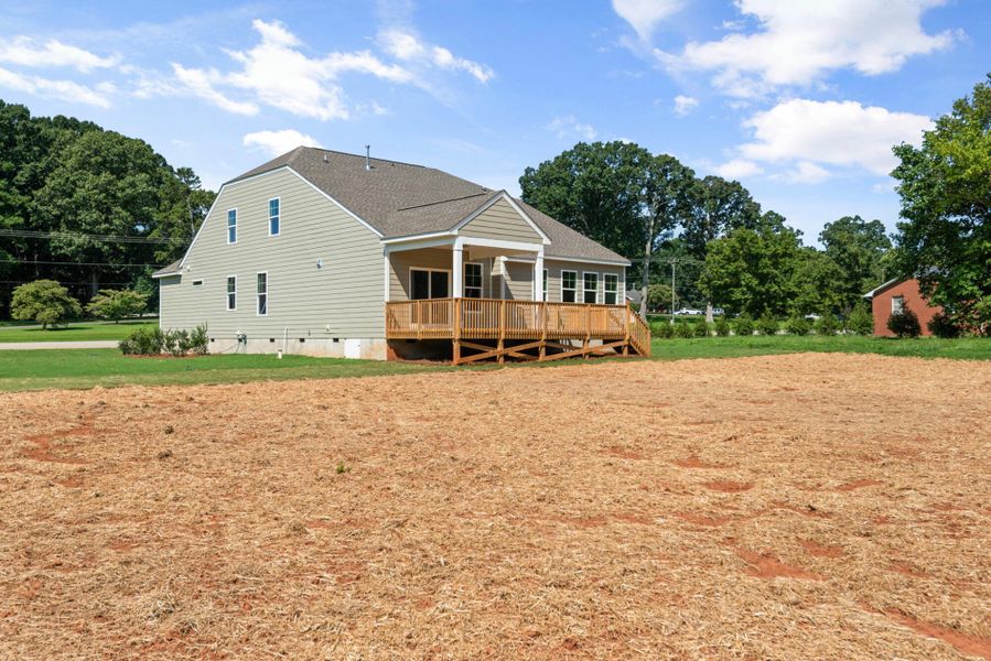 Front exterior of a new home in Redland, Advance, NC, highlighting curb appeal (Image 23). Front exterior of a new home in Redland, Advance, NC, highlighting curb appeal (Image 23).