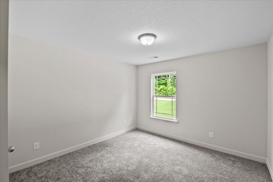 Representative unfurnished interior of a home built from the Elliott by Enchanted Homes in Gentry Place, Spartanburg (Image 11).